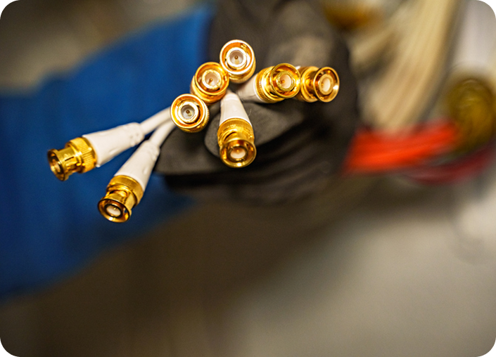 Close-up of gold cable connectors