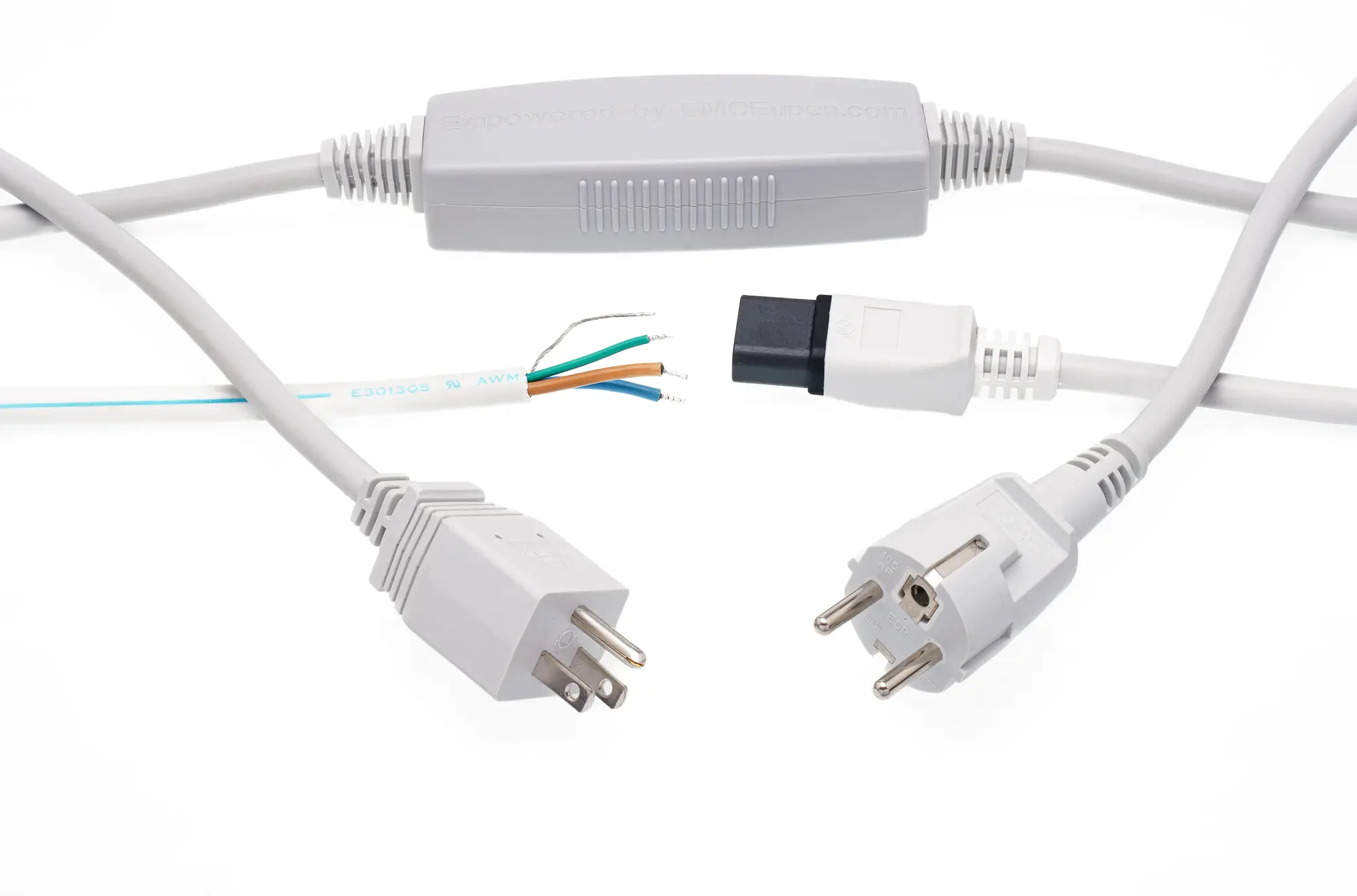 Various white electrical plugs and a small power adapter with exposed wires.