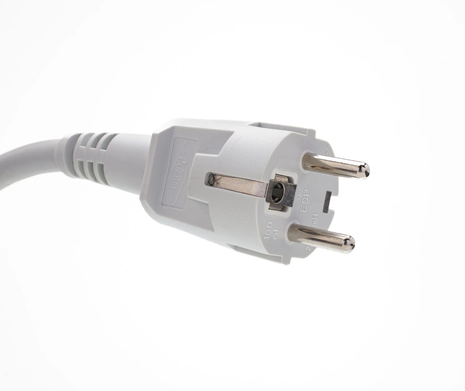 Close-up of a white European power plug.