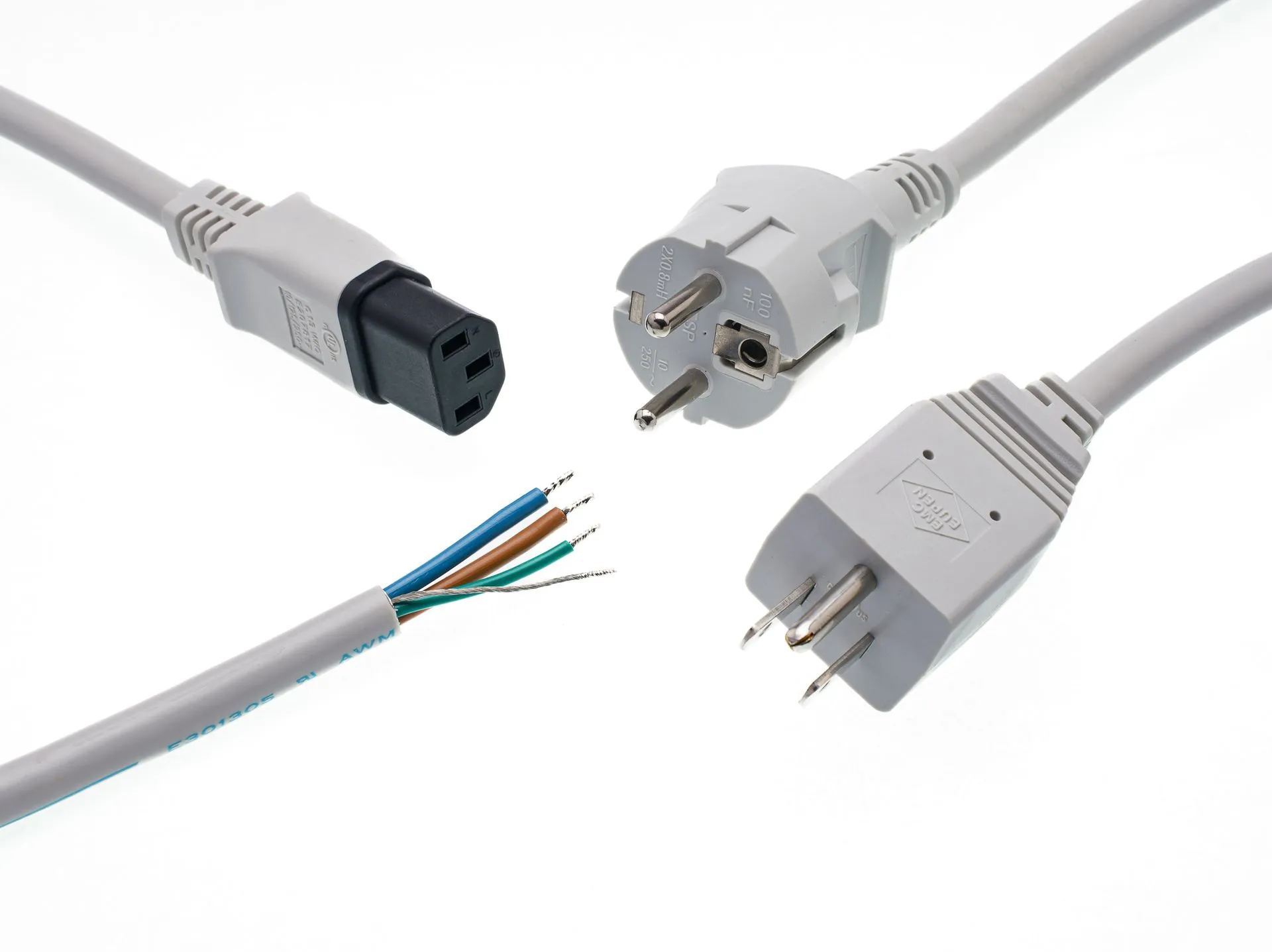 Various electrical plugs and a stripped cable with exposed wires.